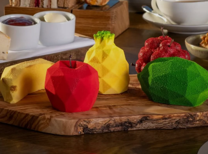 Botanical afternoon tea collection with sculptural fruit pastries