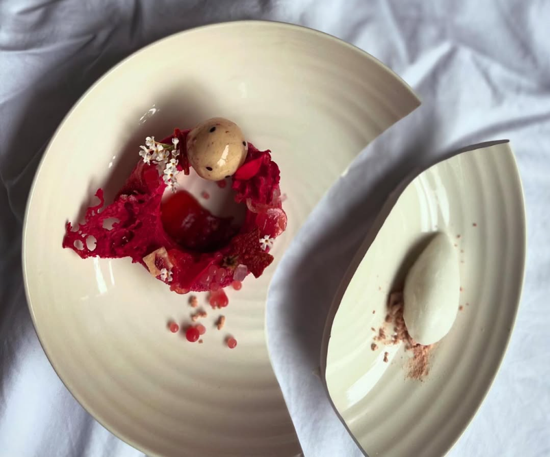 Red plated dessert with ice cream
